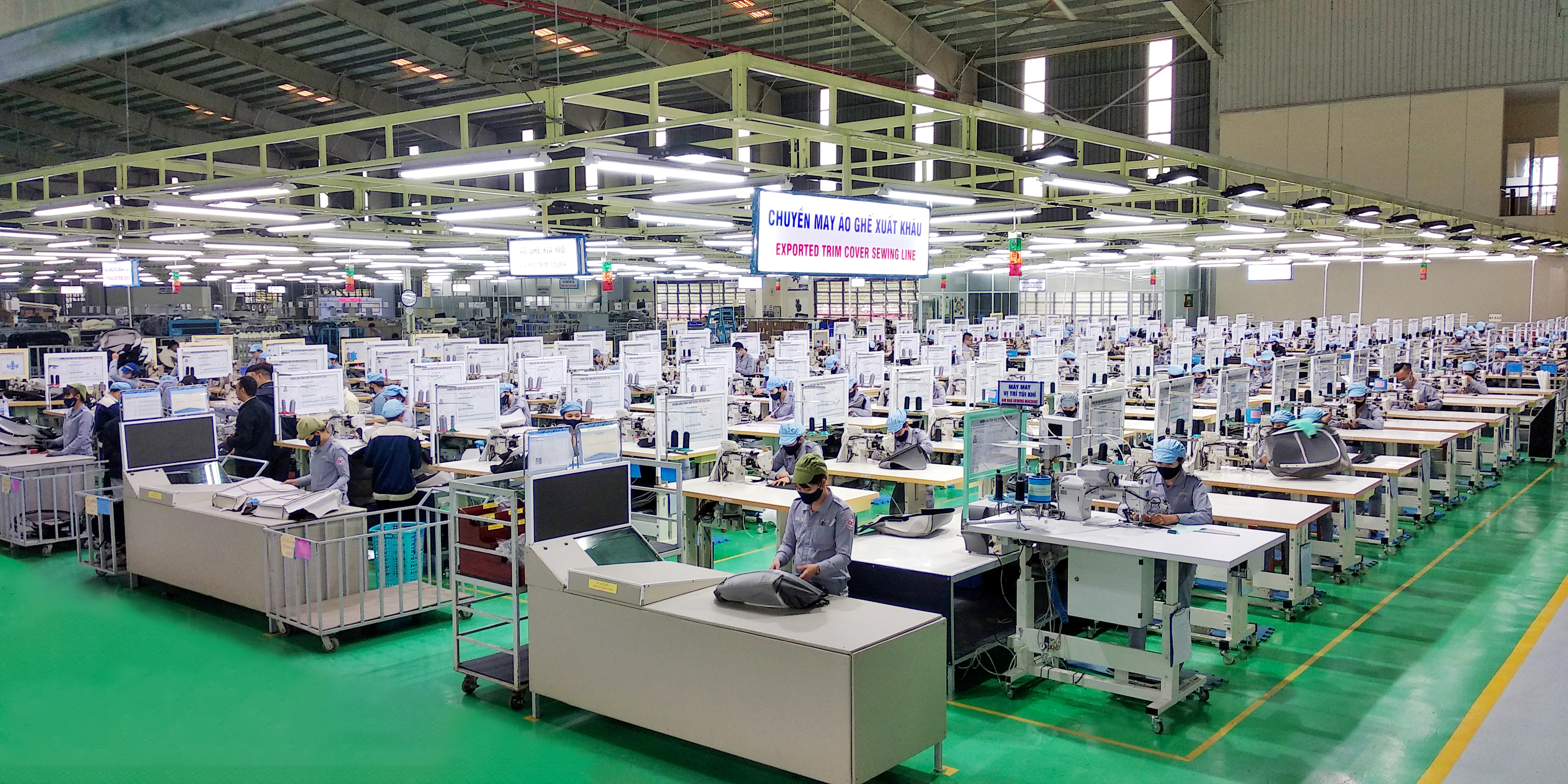 Day chuyen may ao ghe xuat khau.jpg