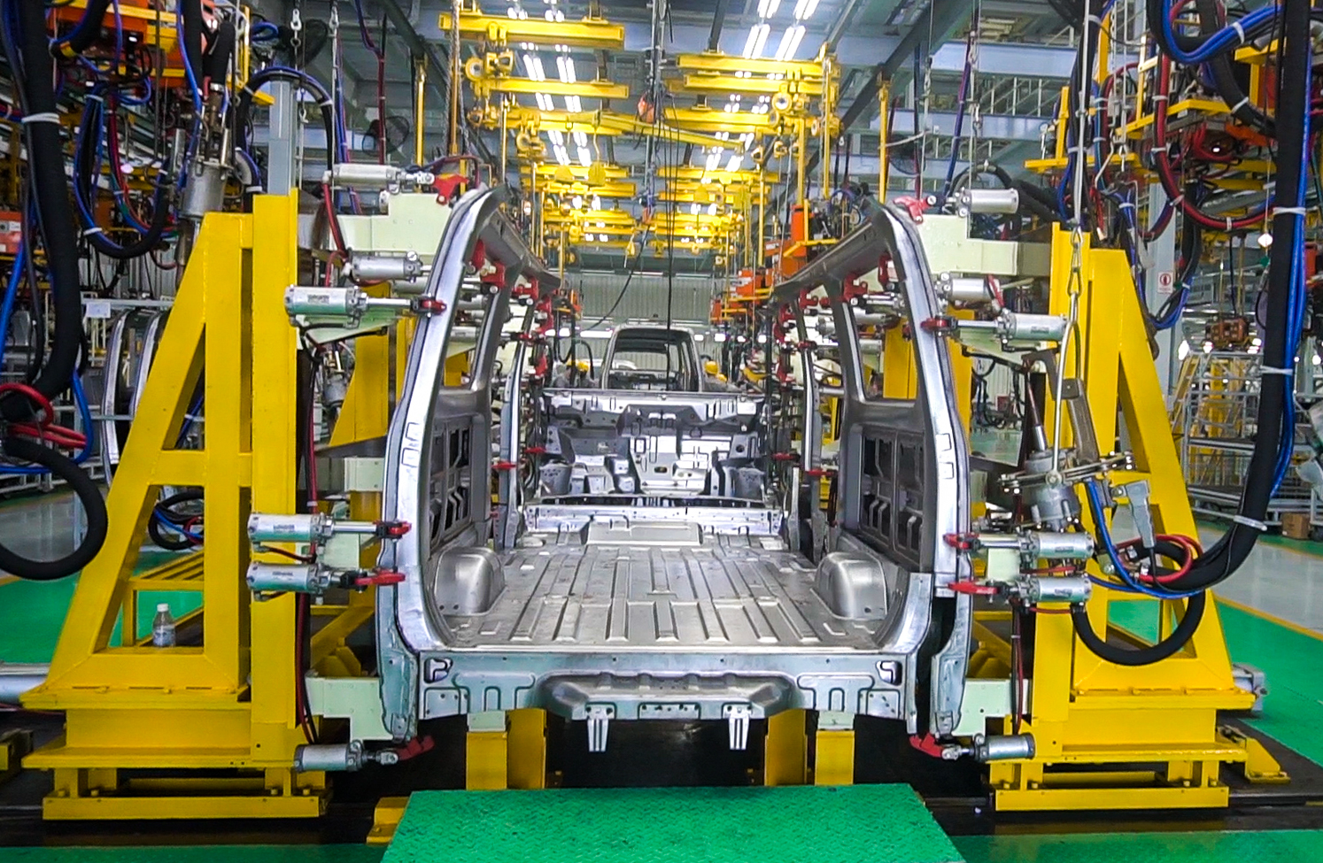 Thiết kế gia công Jig và lắp đặt hệ thống thiết bị dây chuyền hàn bấm body xe tải Towner Van.jpg